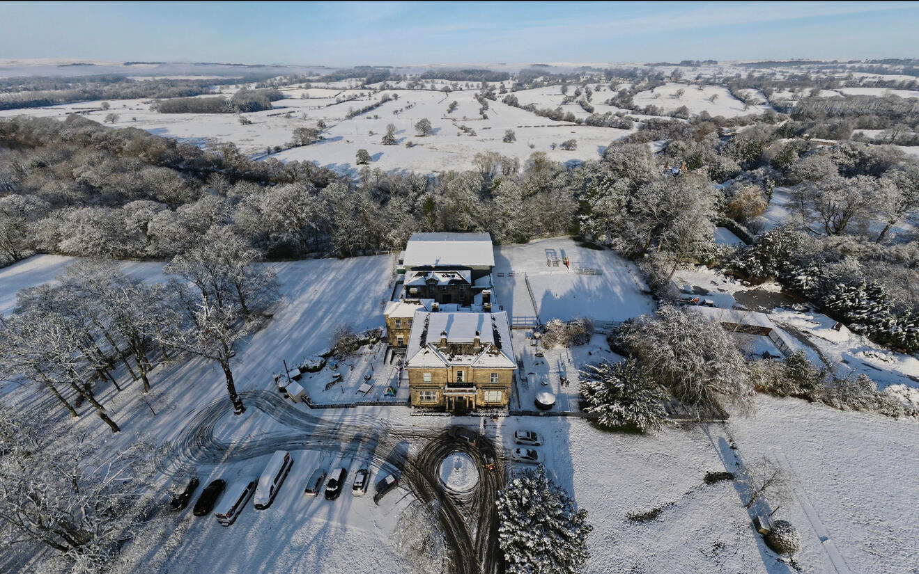 Ghyll Royd Primary School Clear Snowy Landscape 4k Drone Photo Wallpaper